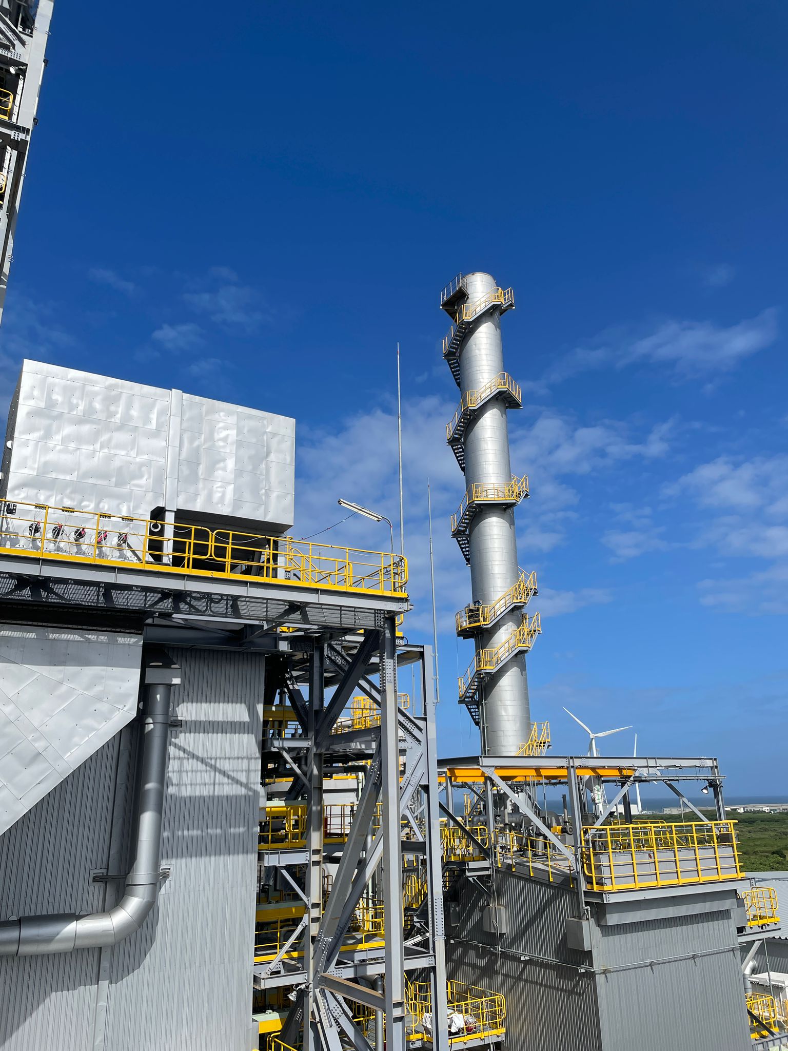 Steel structures and equipment at a biomass power plant in Japan.